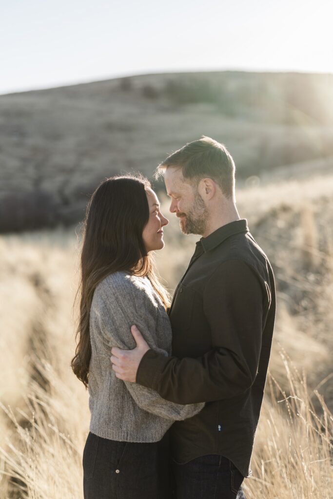 Couple posing in Logan Utah for their wedding photo announcement
