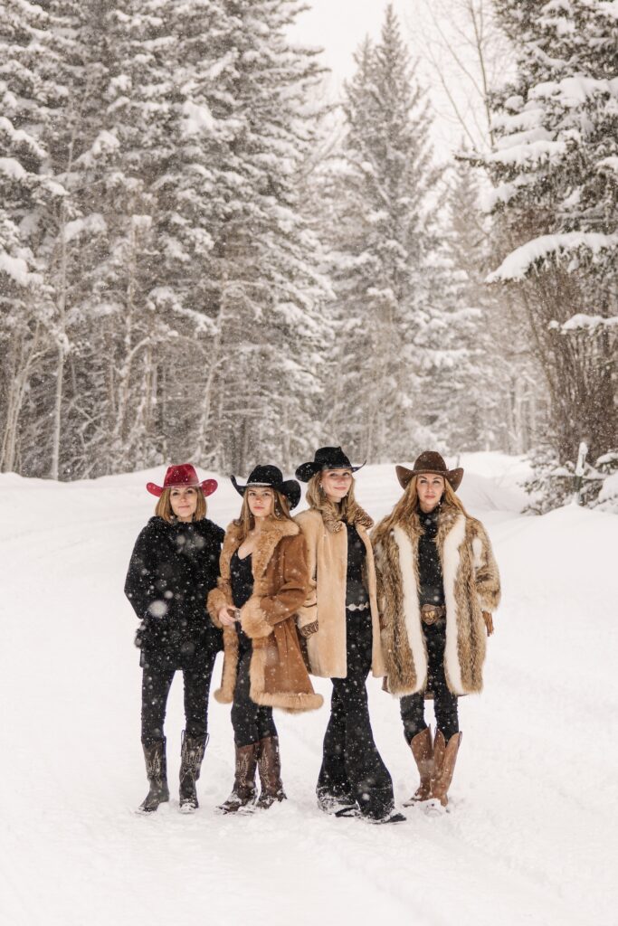 Winter Photo shoot in Jackson Hole, girls trip, cowboy hats, furs and cowboy boots.