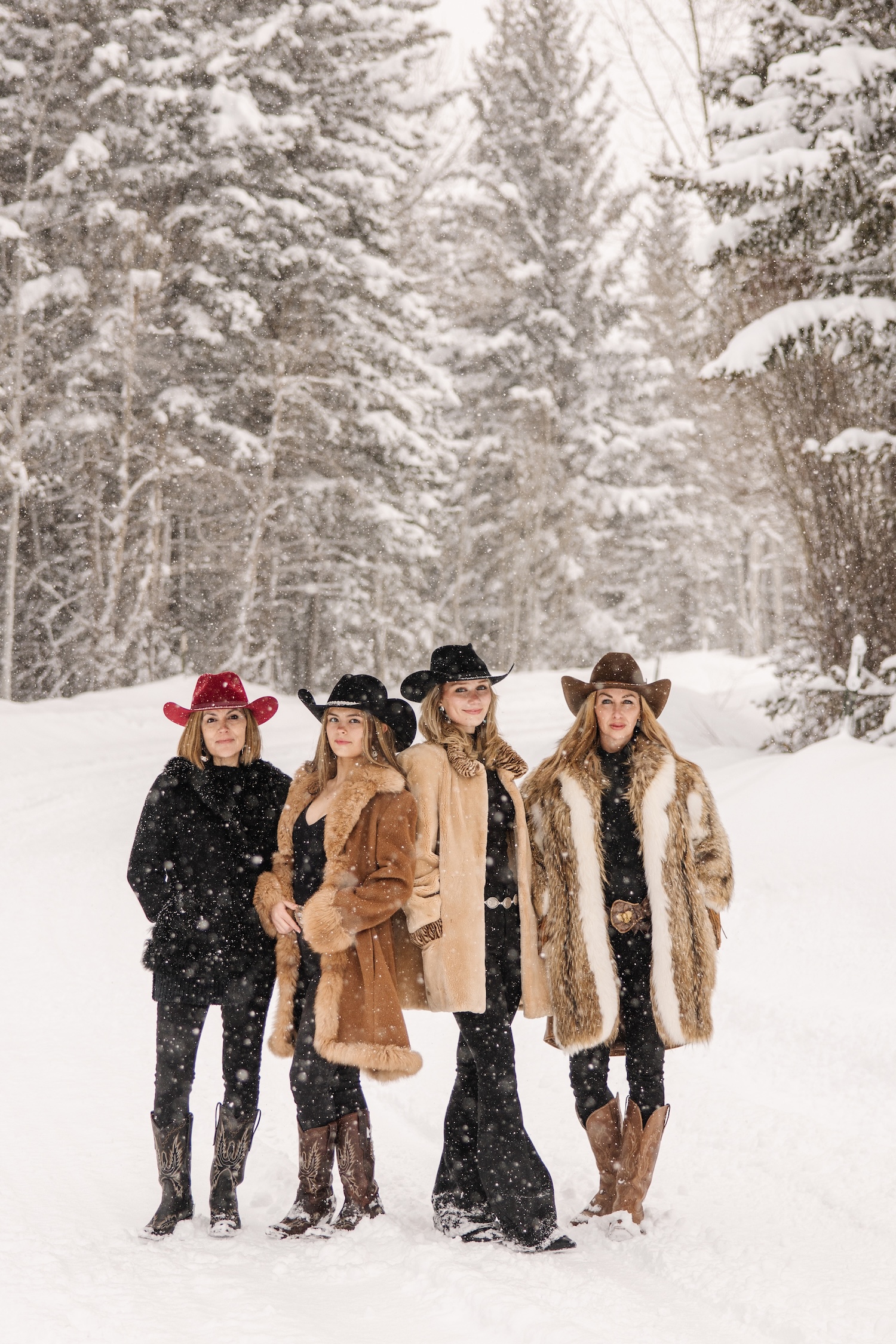 Photos of a girls trip in Jackson Hole Wyoming, cowboy hats and fur coats