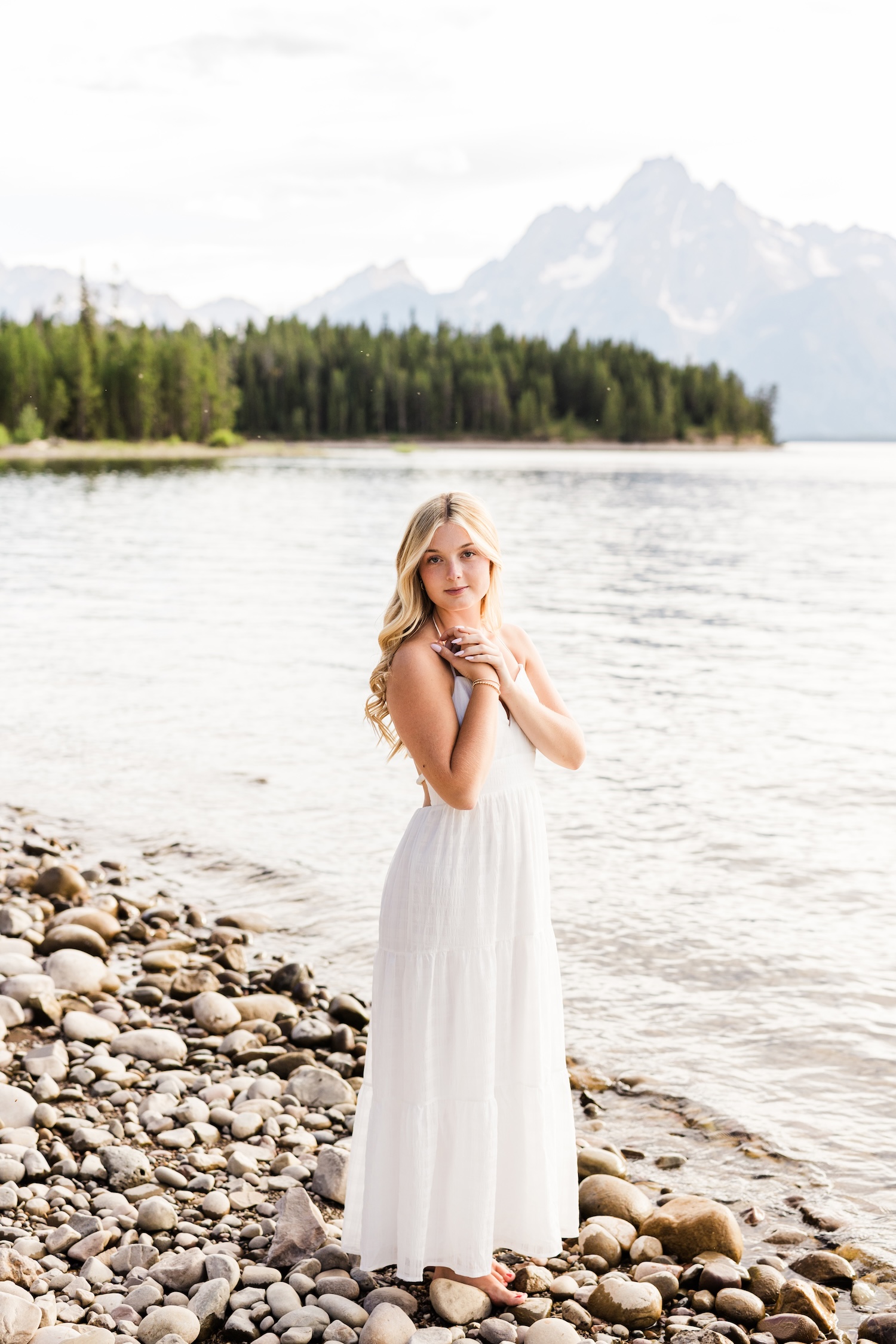Beautiful girl posing for her senior photos in the Tetons.